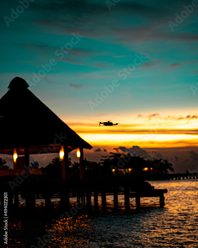 Fototapeta Naklejka Na Ścianę i Meble -  drone on sunset maldives