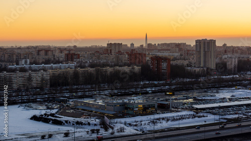 Urban landscape with residential buildings at sunset