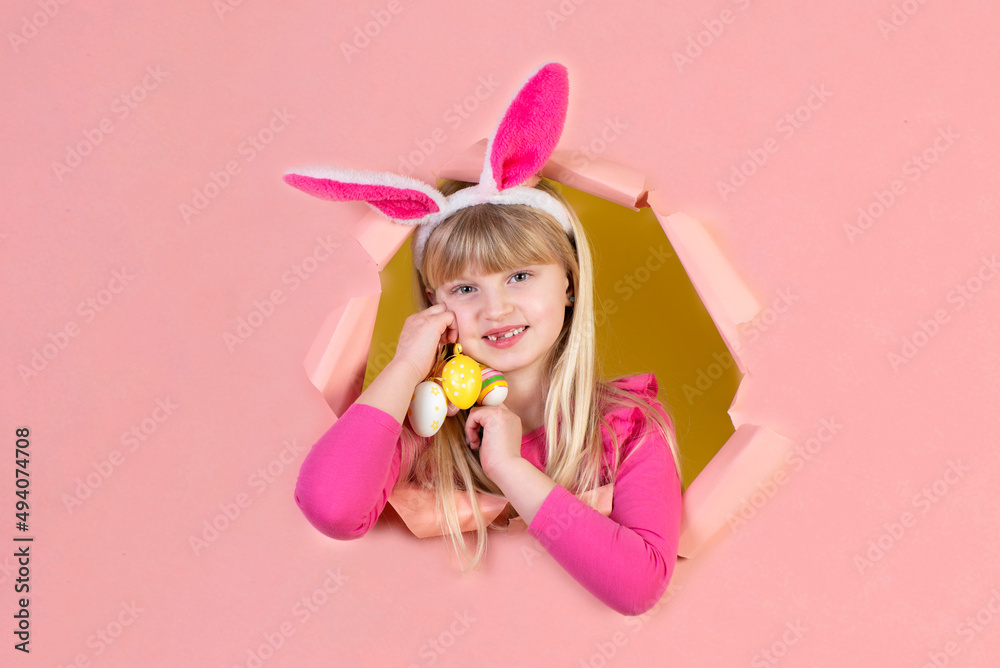Little blonde girl for the Easter holidays with eggs Little blonde girl for the Easter holidays with eggs