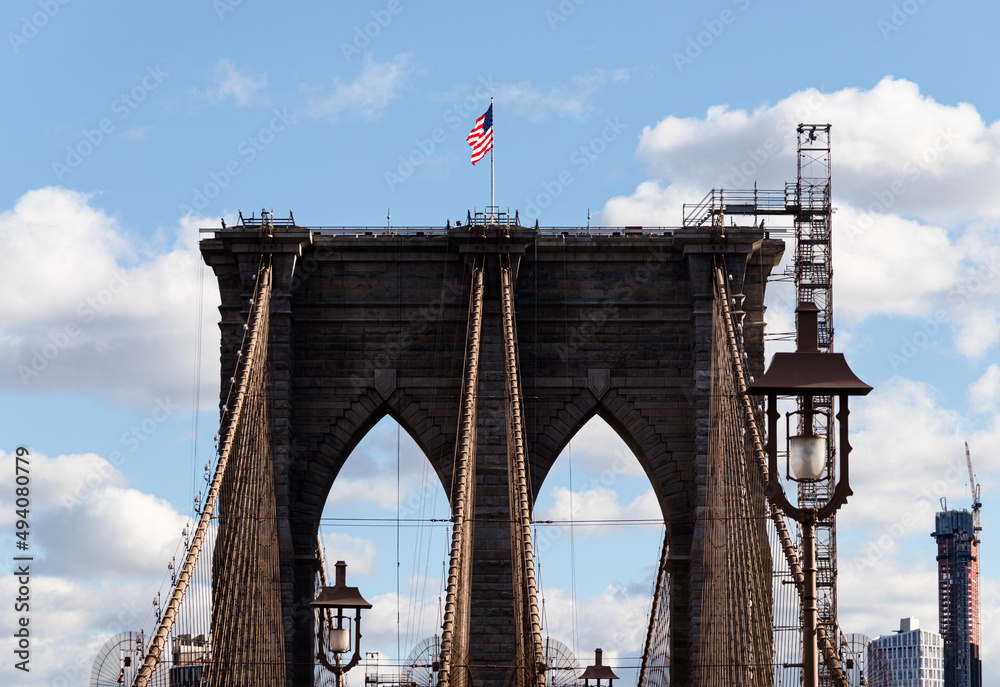 Fototapeta premium Brooklyn bridge and USA flag 