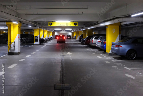 Modern underground parking, facilitation in the organization of city traffic, underground streets lit up time ...