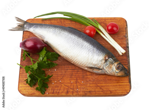 Herring fish on cutting board