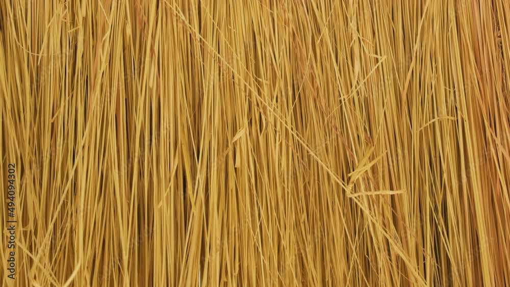 Close up of yellow striped straw texture as background Close up of yellow striped straw texture as background