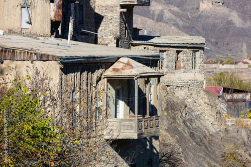 Akhty village, Dagestan, Russia. View of the balconies, roofs and stone walls of houses. Buildings of the village of Akhty photo