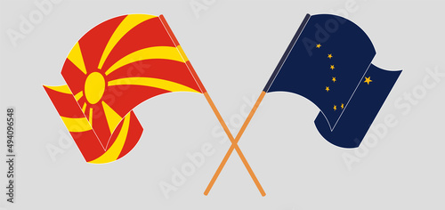 Crossed flags of North Macedonia and the State of Alaska. Official colors. Correct proportion