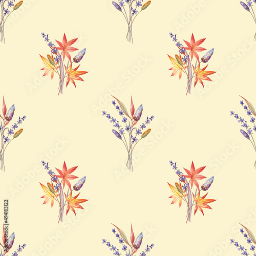 Seamless pattern with the lavender flowers, grasses and herbs, and autumn maple leaves. Creamy yellow background and elegant plants painted with watercolors. For fabric, wrapping paper, wallpapers. 