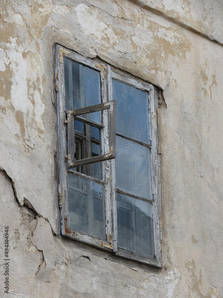 an old window in a wall
