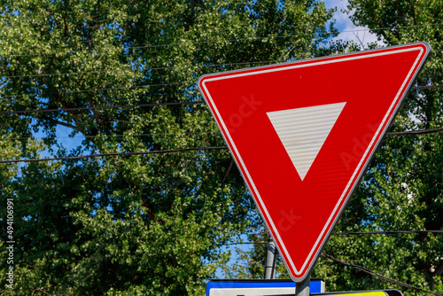 фотографія Road warning sign red inverted triangle