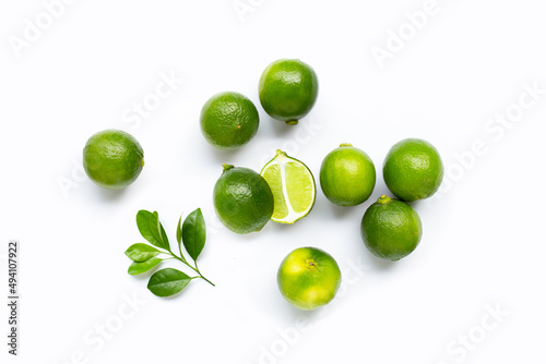 Fresh limes isolated on white background. © Bowonpat