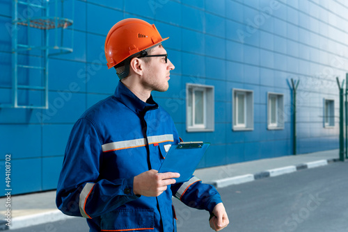 a architect male personon the costruction site, industry technology photo