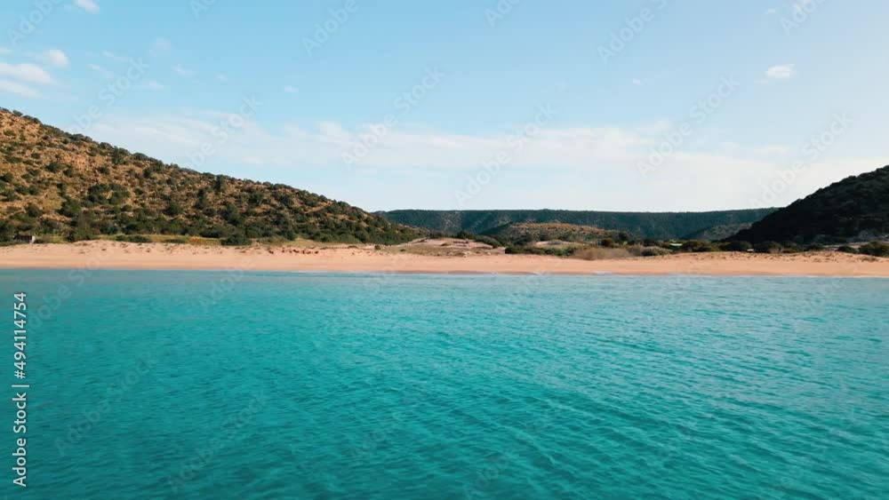 Aerial 4k Karpaz Golden Beach with crystal clear water and sandy coastline in North Cyprus, which offer you tropical exotic beach feeling with its natural untouched beauty in Cyprus Island.