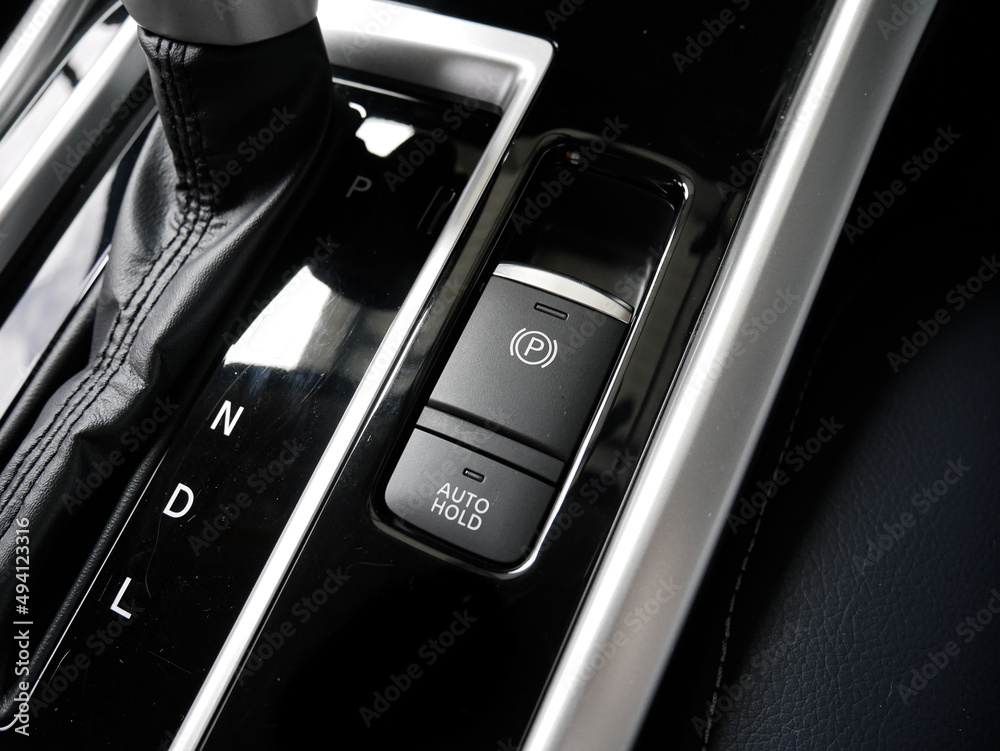 Electric Parking Brake Button and Auto Brake Hold Button Next to CVT