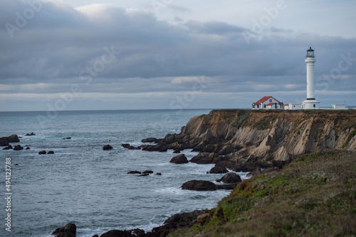 Point Arena Lighthouse on the cliffs with stormy skies