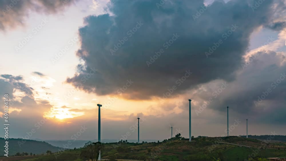 Time-lapse video Windmill generator electric power park Eco power park system. Sunset sky background. 4k 3840x2160p Time-lapse video Windmill generator electric power park Eco power park system. Sunset sky background. 4k 3840x2160p