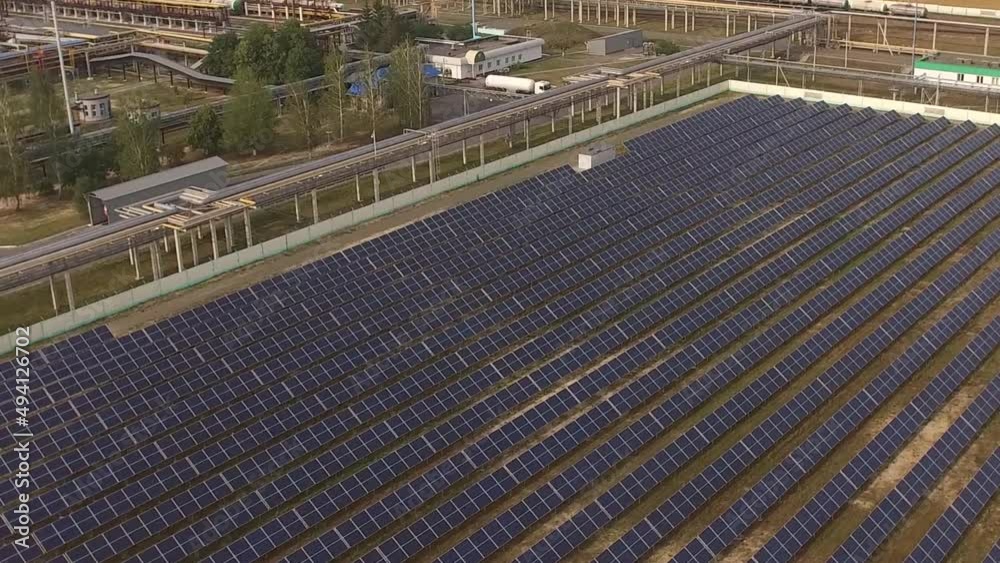 Green energy concept - solar panels straight forward shot. Aerial view