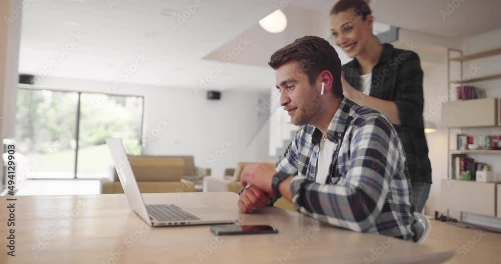 Business couple gesturing hands during conference video call. Serious businessman and businesswoman chatting online at laptop. Multi ethnic business team having online conversation at workplace