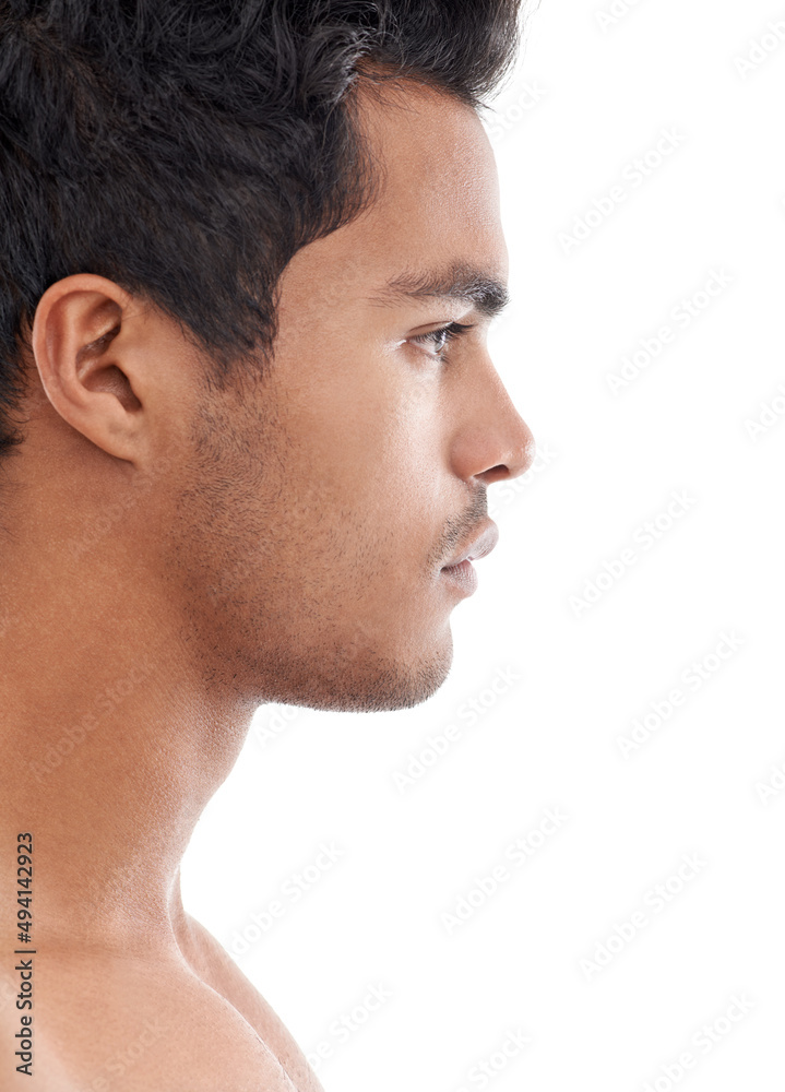 Serious profile. Profile shot of a handsome young man isolated on white. Serious profile. Profile shot of a handsome young man isolated on white.