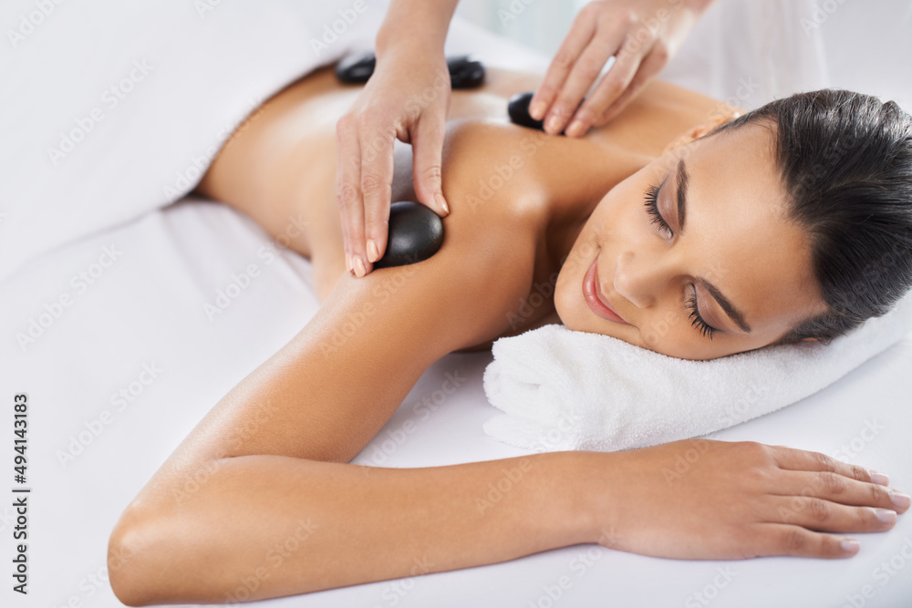 It doesnt get anymore relaxing.... Cropped shot of a beautiful young woman relaxing during spa treatment. It doesnt get anymore relaxing.... Cropped shot of a beautiful young woman relaxing during spa treatment.