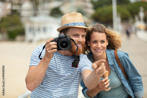 a happy tourists taking photos © auremar