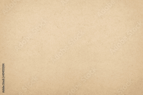 Brown recycled craft paper texture background. Cream cardboard texture, Old vintage page or grunge vignette. Pattern rough art creased grunge letter. Cardboard with copy space for text.