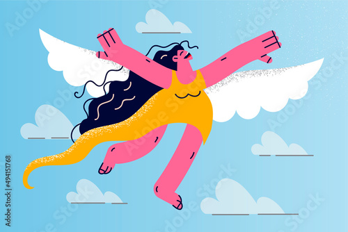 Happy woman with wings flying in sky