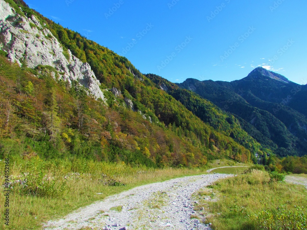 Scenic view of forest and rock covered mountain ridge above Ljubelj in Karavanke mountains, Slovenia on the path to Zelenica in autumn