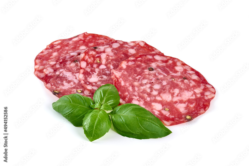 Italian Salami with basil leaves, isolated on white background. Italian Salami with basil leaves, isolated on white background.