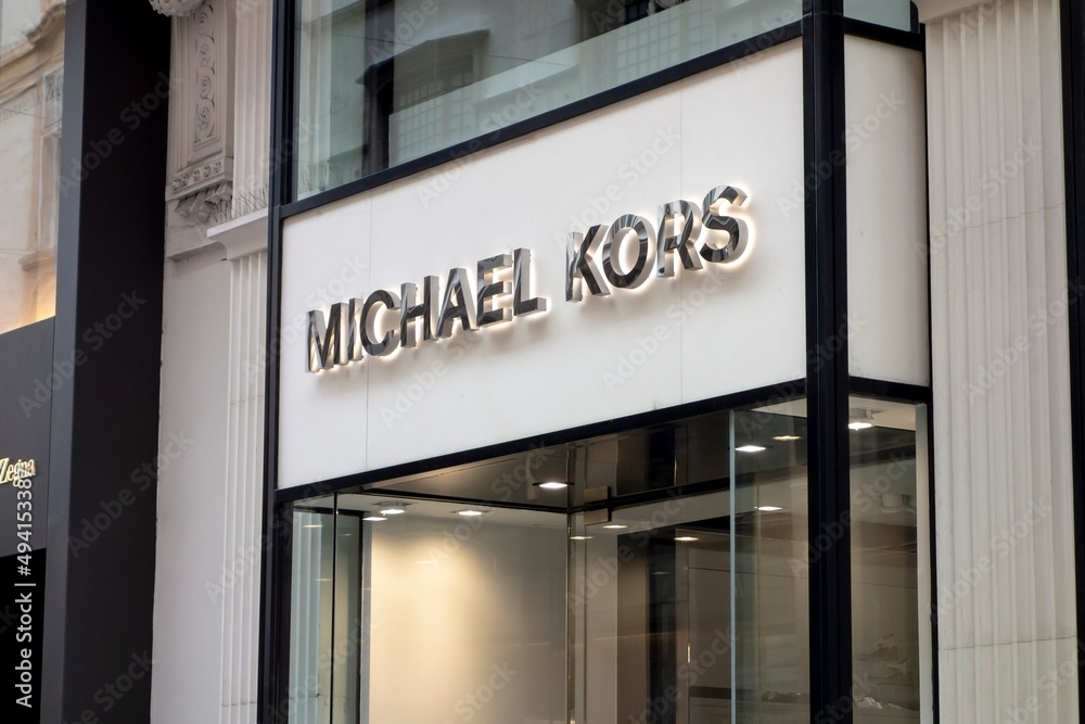 Storefront of Michael Kors boutique shop selling accessories like luxury  bags for women in Vienna Stock Photo