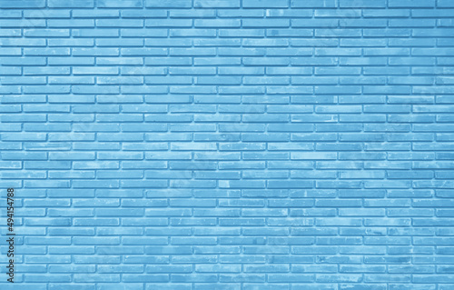 Pastel blue brick wall texture background. Brickwork painted of blue color interior backdrop.