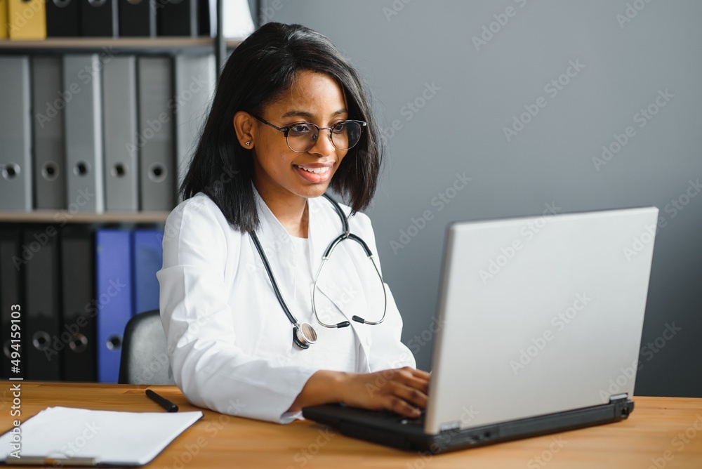 African female doctor make online telemedicine video call consult patient. Afro american black woman therapist talking to camera in remote videoconference chat. Webcam view, face headshot African female doctor make online telemedicine video call consult patient. Afro american black woman therapist talking to camera in remote videoconference chat. Webcam view, face headshot