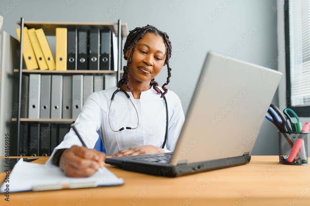 African female doctor make online telemedicine video call consult patient. Afro american black woman therapist talking to camera in remote videoconference chat. Webcam view, face headshot African female doctor make online telemedicine video call consult patient. Afro american black woman therapist talking to camera in remote videoconference chat. Webcam view, face headshot