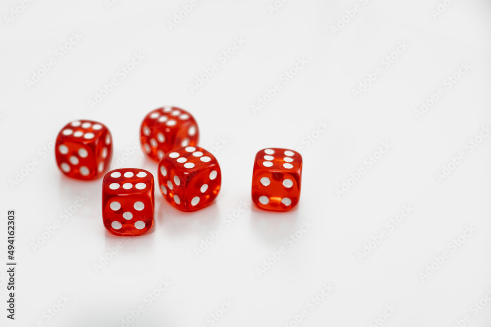 Casino and gambling concept. Five red glass dice on white background. Casino and gambling concept. Five red glass dice on white background.