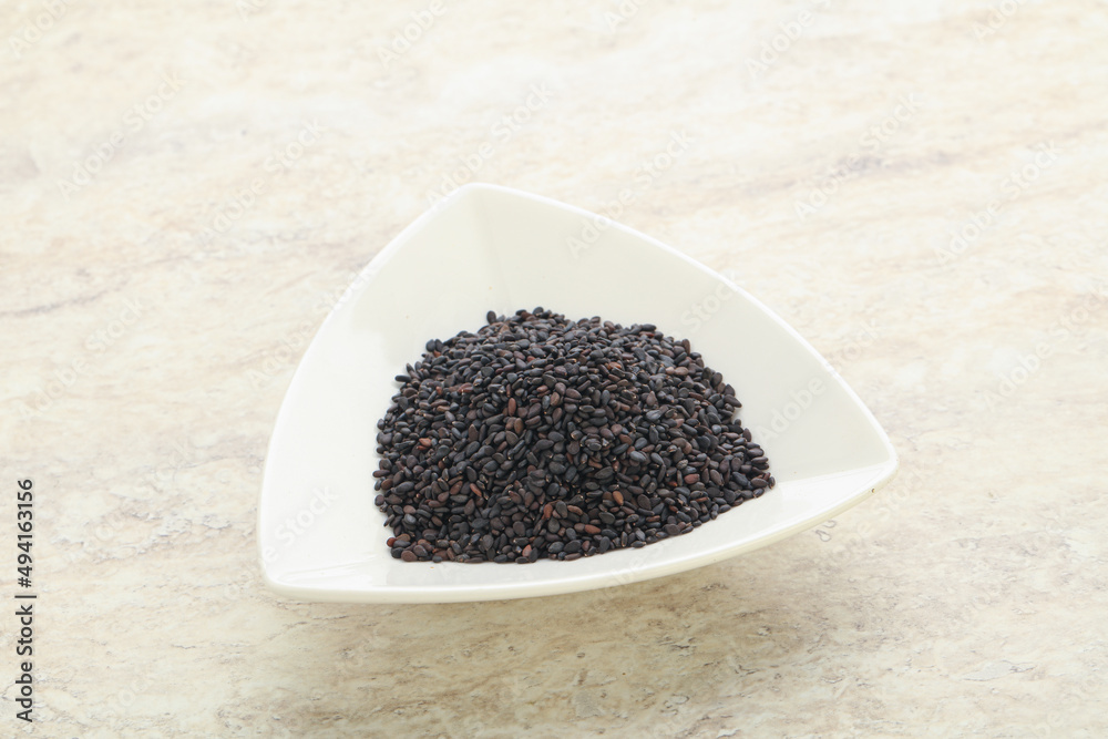 Black sesame seeds in the bowl Black sesame seeds in the bowl