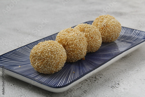 Freshly made Chinese dessert food called Buchi or Sesame balls with sweet filling photo