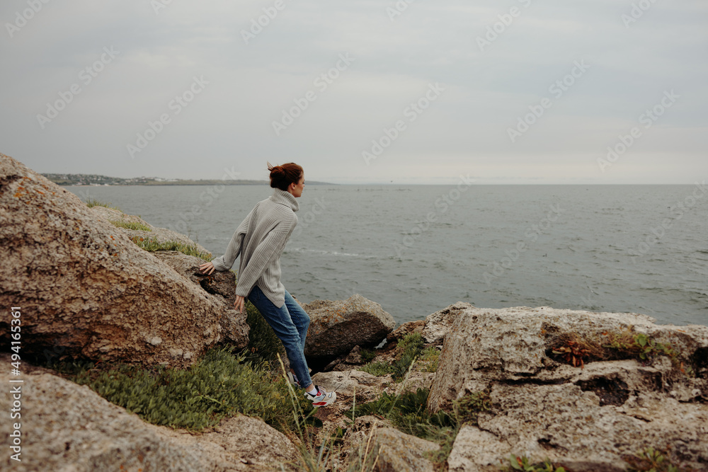 portrait of a woman freedom walk on the stone coast unaltered portrait of a woman freedom walk on the stone coast unaltered