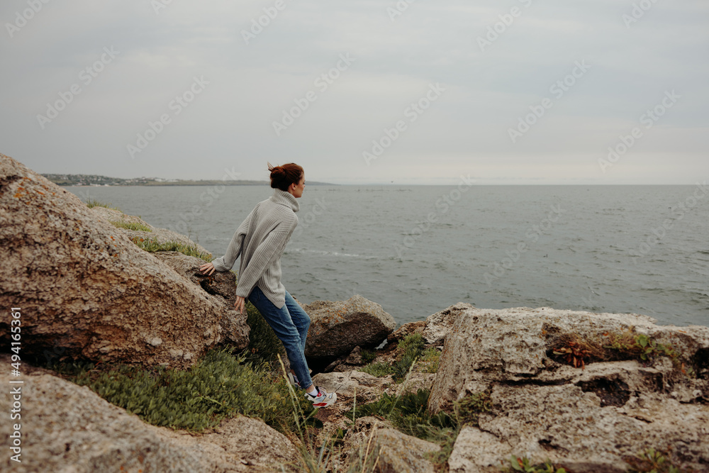 portrait of a woman freedom walk on the stone coast unaltered