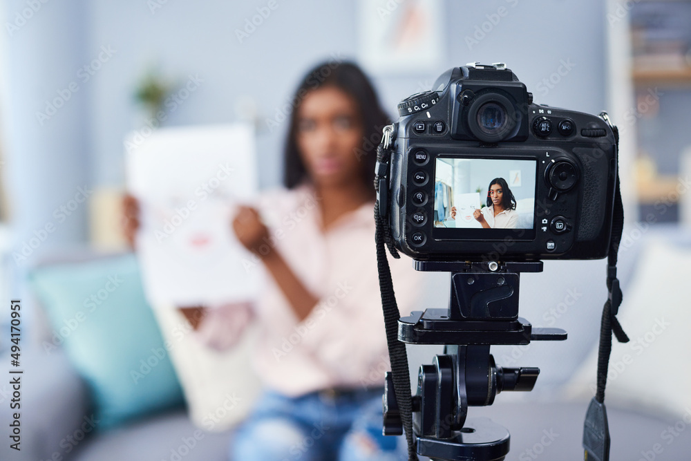Helping others learn how to apply make up by vlogging. Cropped shot of an attractive young woman working at home. Helping others learn how to apply make up by vlogging. Cropped shot of an attractive young woman working at home.