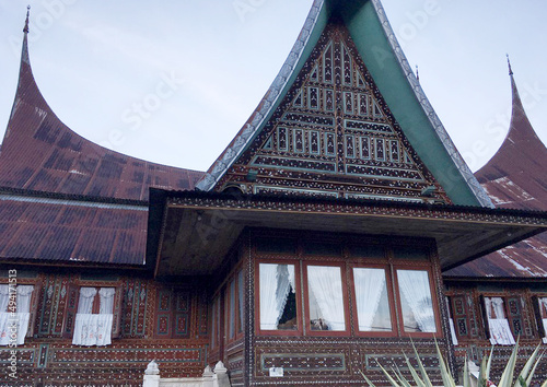A communal rumah gadang is a long house, rectangular in plan, with multiple gables and upsweeping ridges, forming buffalo horn-like ends. They normally have three-tiered projections, each with varying photo