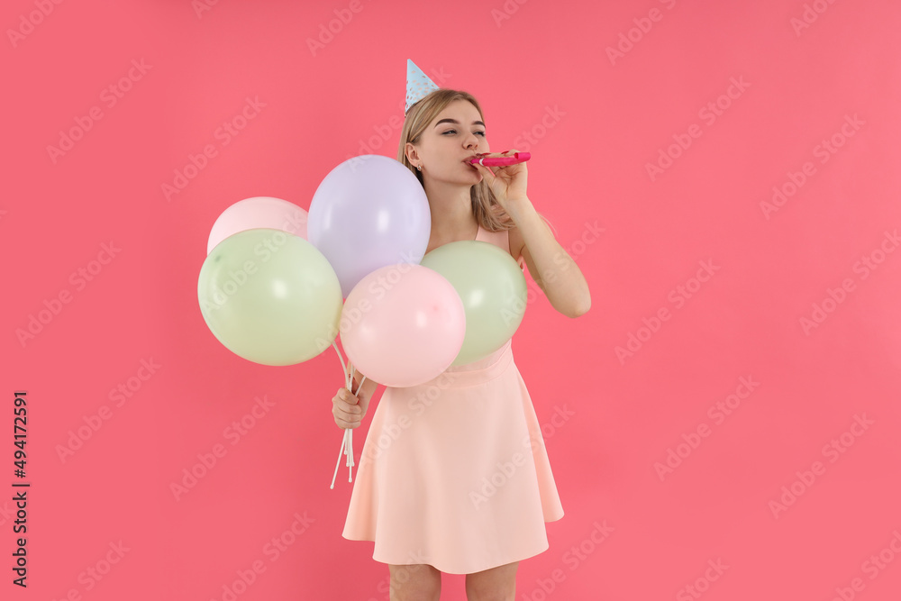 Concept of Happy Birthday with young woman on pink background Concept of Happy Birthday with young woman on pink background