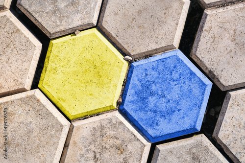 stone tiles with the color of the Ukrainian flag, yellow blue. hexagon. No war. symbol of freedom and independence