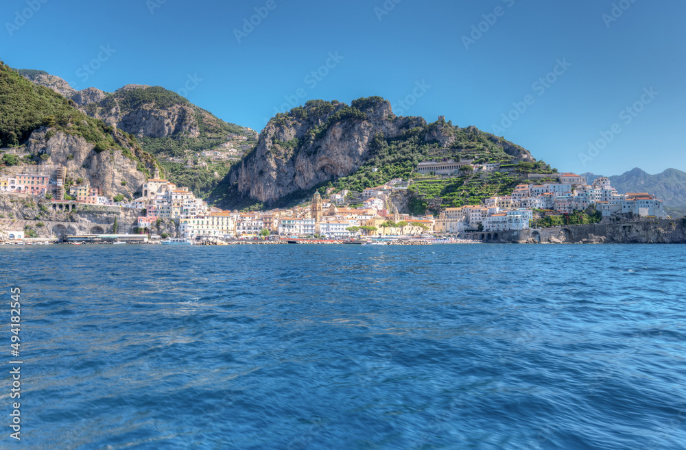 Amalfi coast, Italy - July 01 2021: Spectacular view from the sea on the town of Amalfi