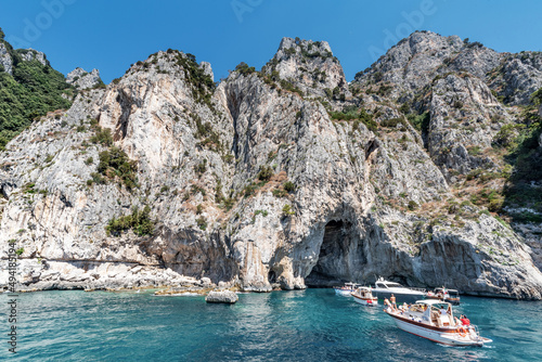 Naples, Capri, Italy - July 06 2021: Characteristic cave in the mountain of Capri, a destination for many visitors.