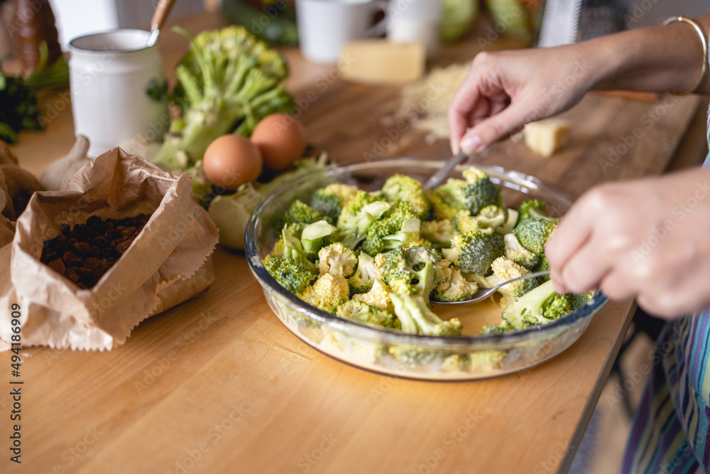 Preparing a bowl of broccoli for lunch Preparing a bowl of broccoli for lunch