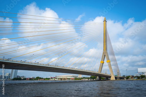 Bangkok, Thailand - March 15 2022: Royal Rama VIII Bridge or Rama 8 Bridge is beautiful bridge across the Chao Phraya river in Bangkok, Thailand. photo