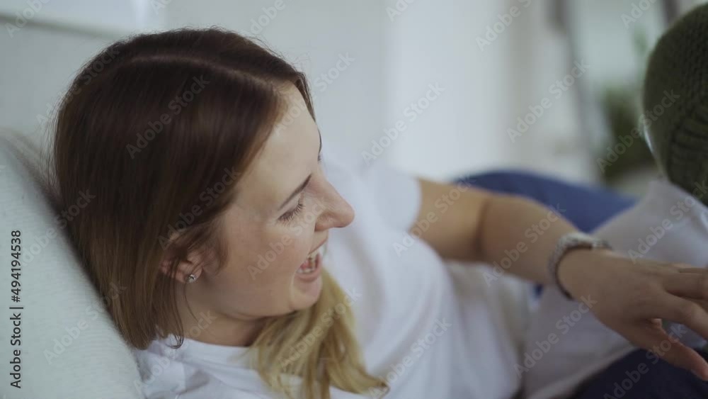 adorable mother and her children, daughter and little son play toys on fingers and have fun at home on the bed Video HD adorable mother and her children, daughter and little son play toys on fingers and have fun at home on the bed Video HD
