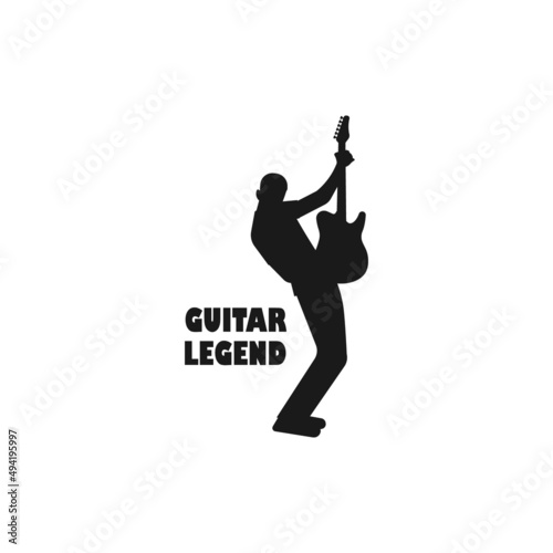 Standing electric guitarist performing black vector silhouette illustration.