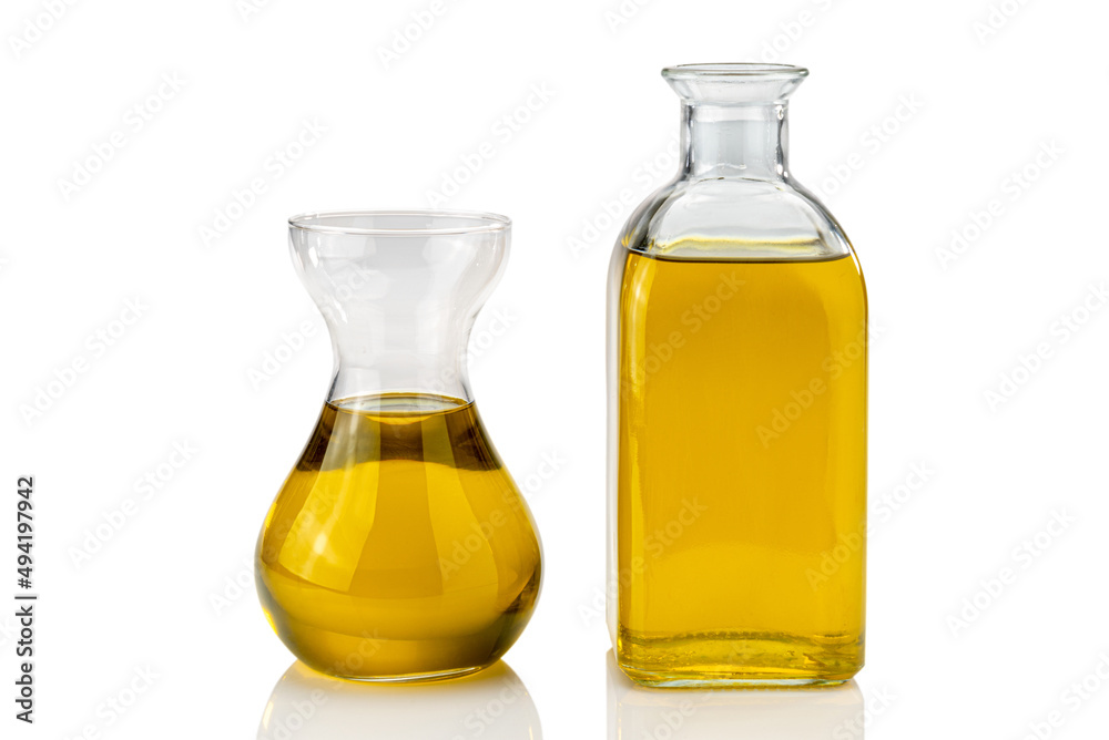 Extra virgin olive oil bottle with decanter isolated on white, clipping path Extra virgin olive oil bottle with decanter isolated on white, clipping path