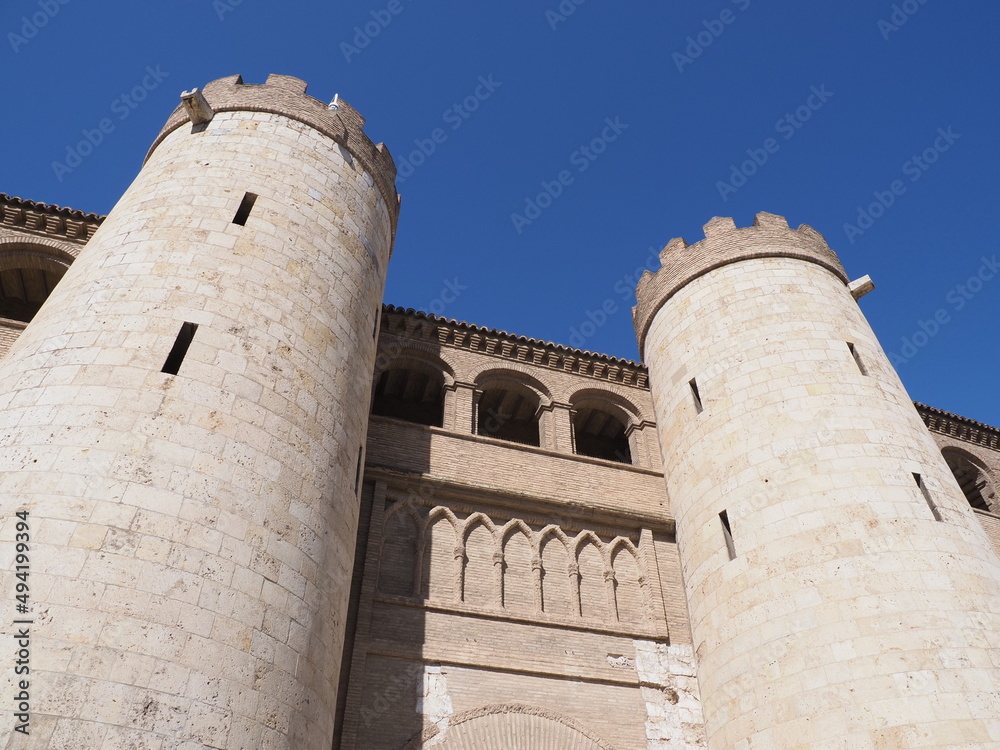 Towers of palace in european Saragossa city in Spain