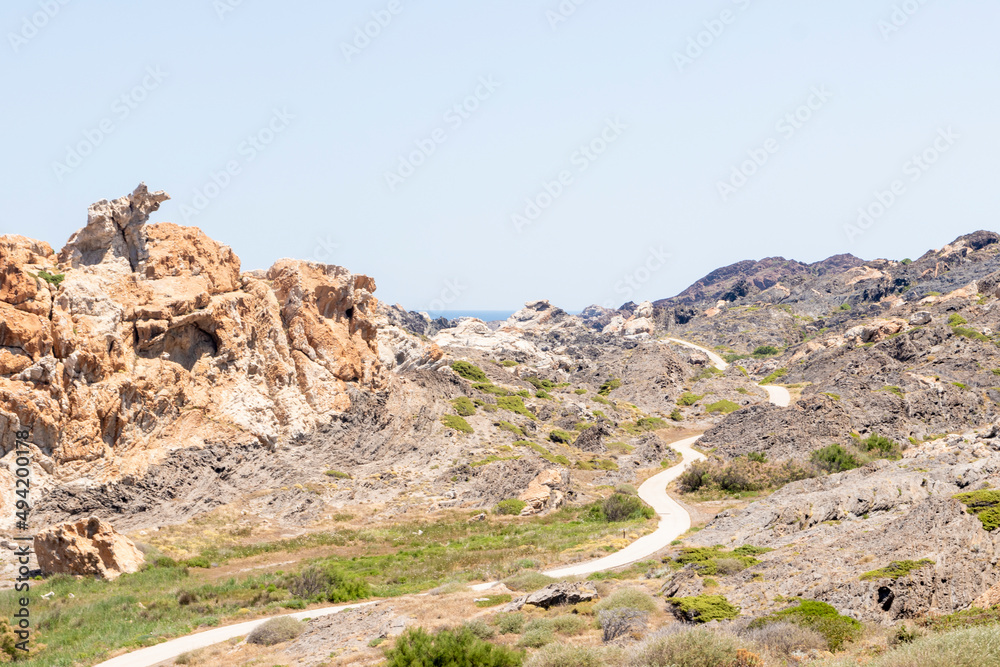 lonely road through cap de creus a hot summer day lonely road through cap de creus a hot summer day