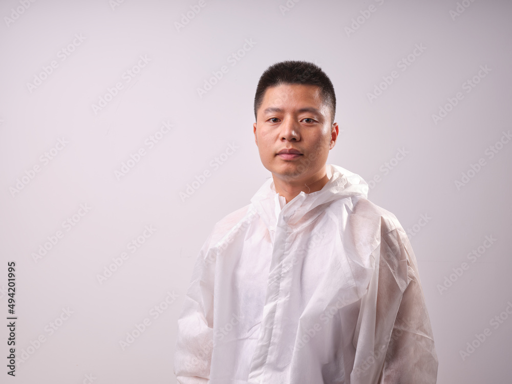 A man in protective clothing ... A man in protective clothing ...